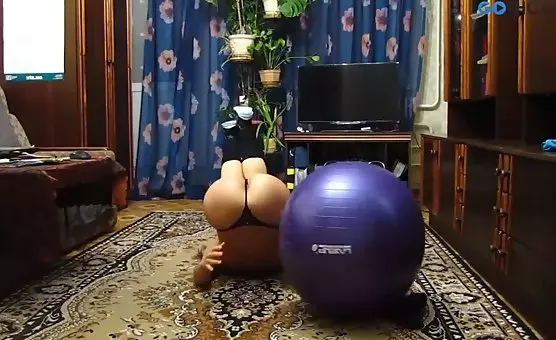 Topless Girl Teasing Ball and Tits Play